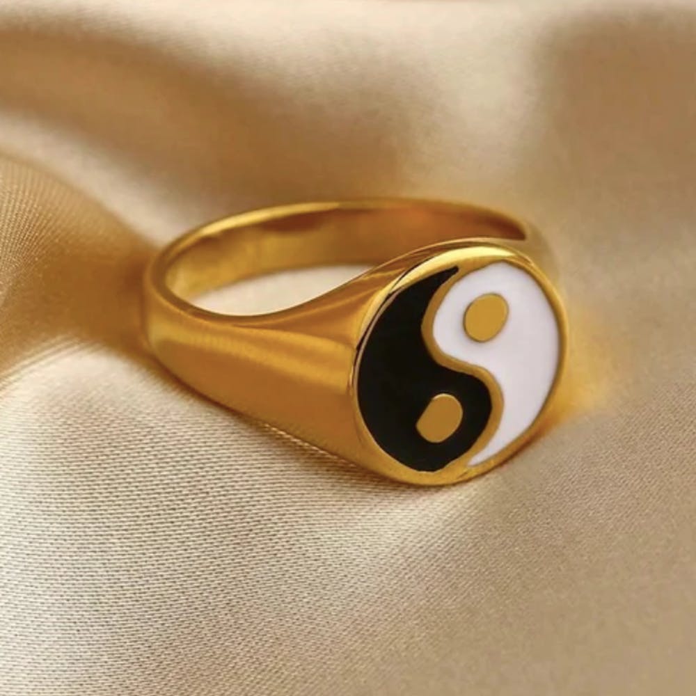 Body jewelry,Gold,Wood,Amber,Jewellery,Wedding ceremony supply,Wedding ring,Metal,Electric blue,Circle