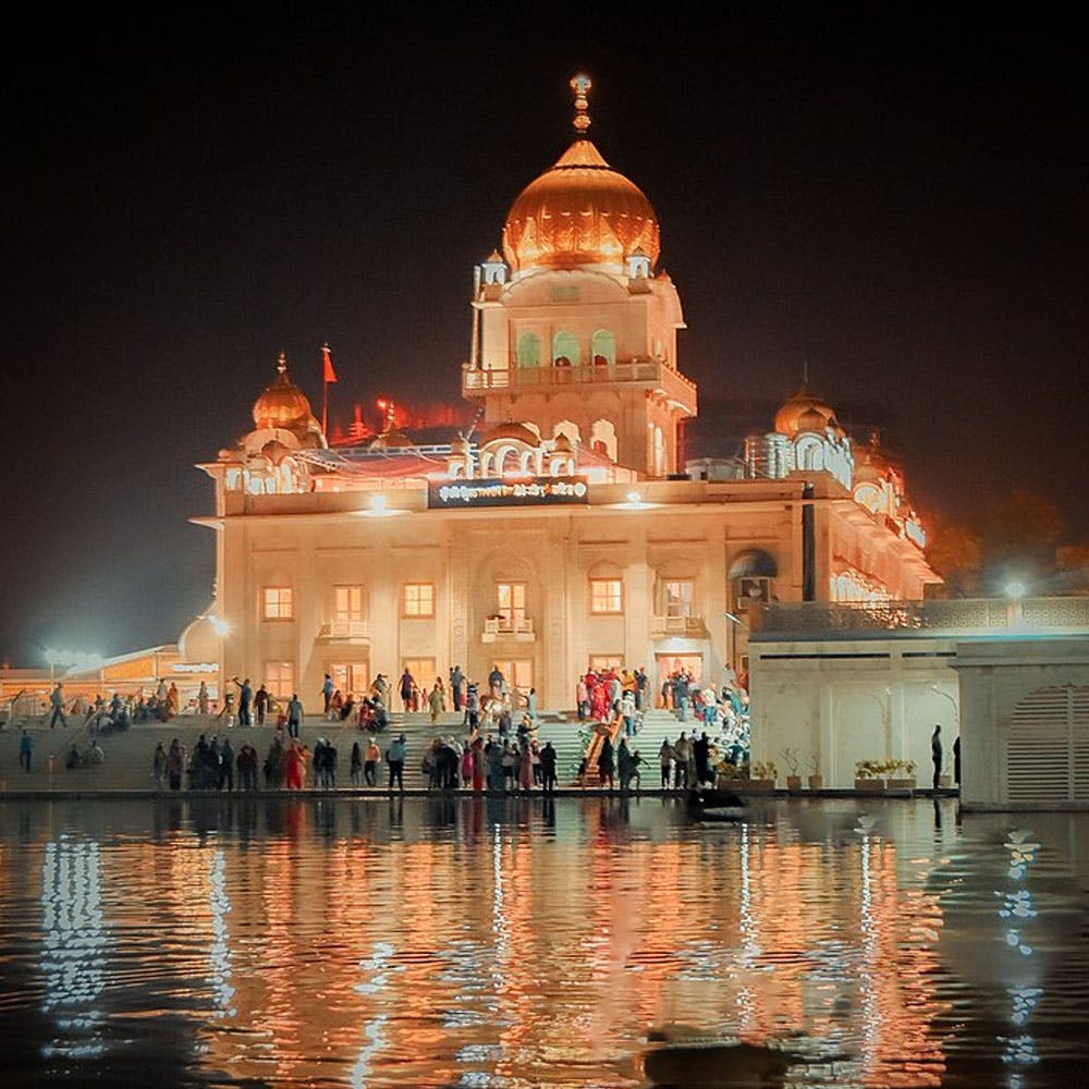 Water,Building,Temple,Body of water,Lake,Sky,Facade,Temple,City,Midnight