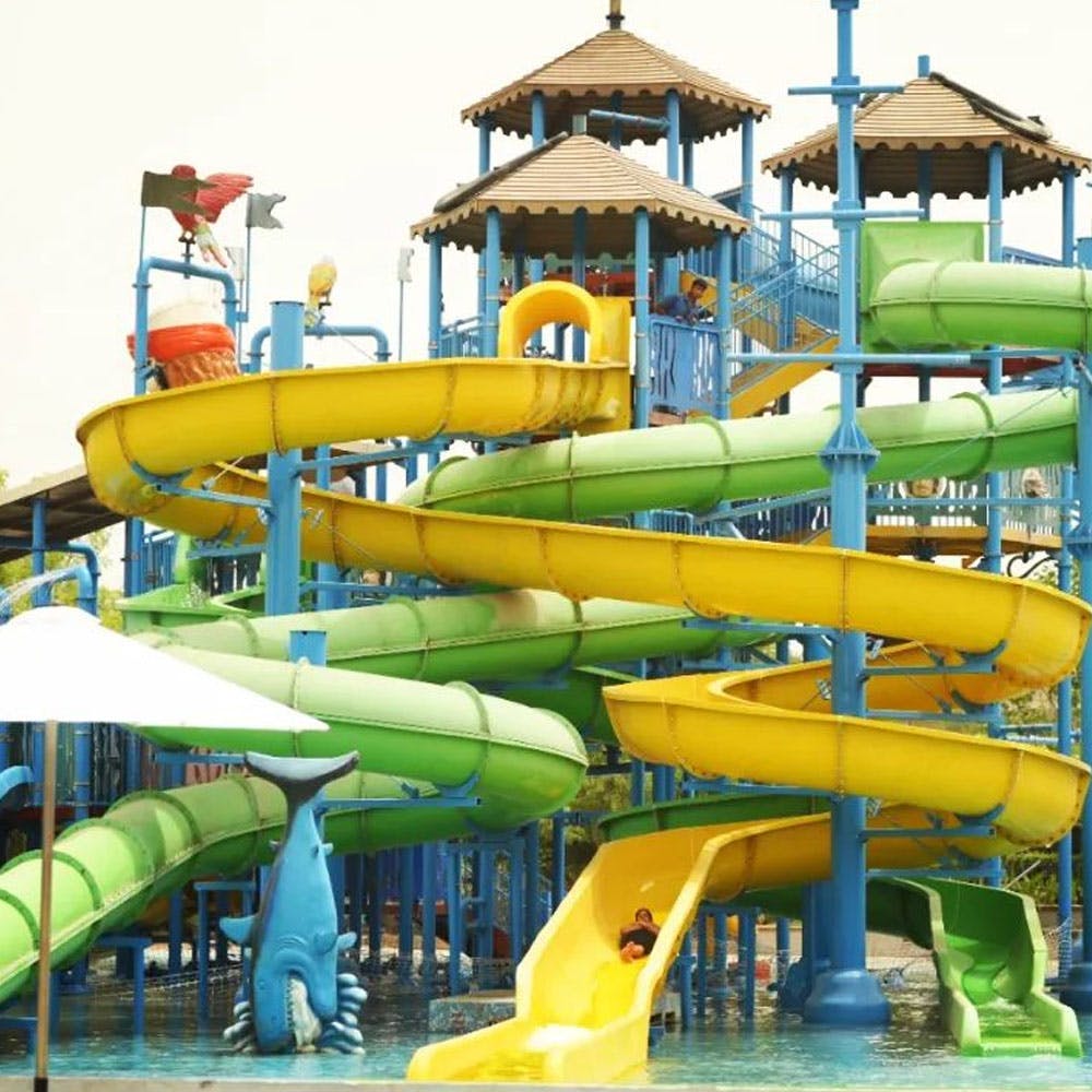 Yellow,Sky,Chute,Leisure,Playground,Aqua,Recreation,Fun,Outdoor play equipment,Amusement ride