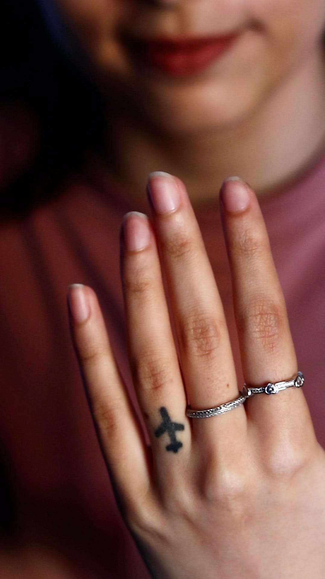 Skin,Joint,Lip,Hand,Body jewelry,Organ,Eyelash,Neck,Finger,Gesture