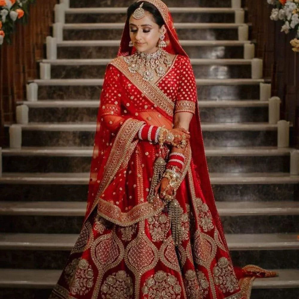 Adorable Red Heavy Embroidery And Hand Work Velvet Bridal Lehenga Choli
