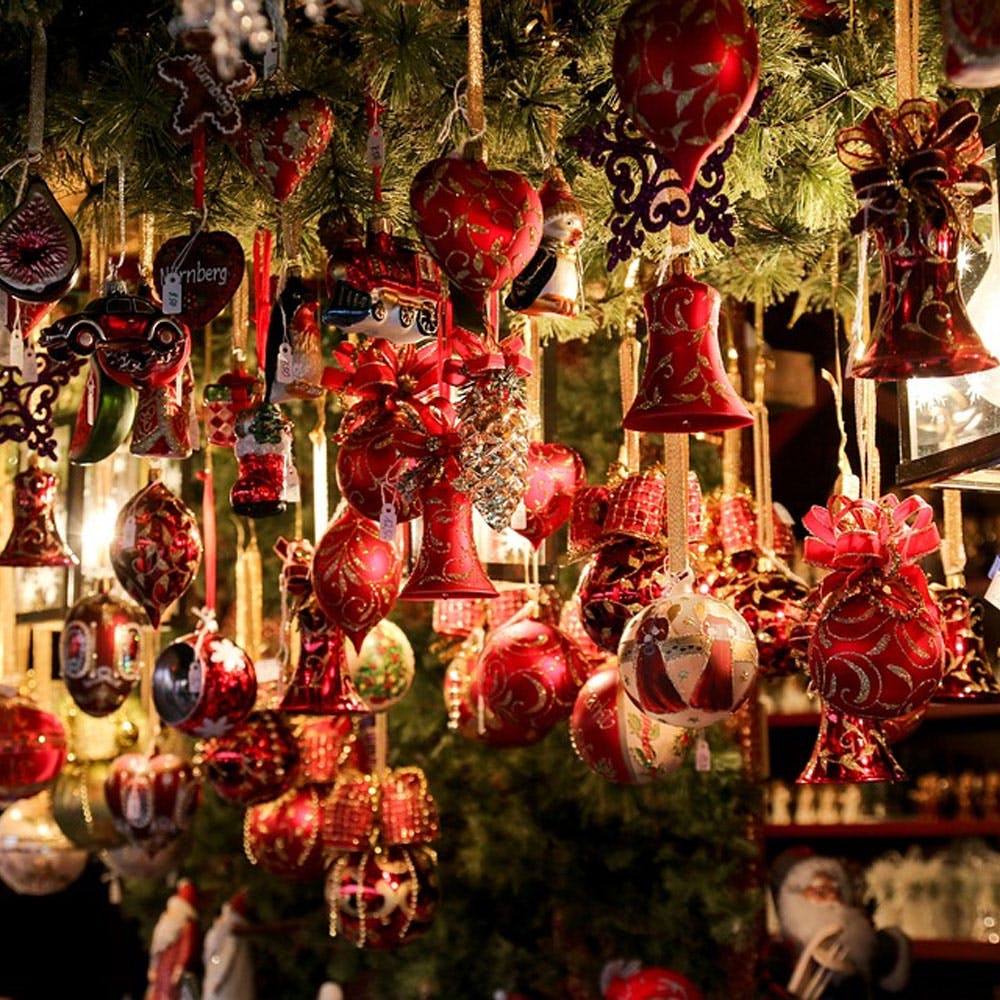 Photograph,Christmas ornament,Organism,Plant,Window,Red,Public space,Christmas decoration,Lantern,Market