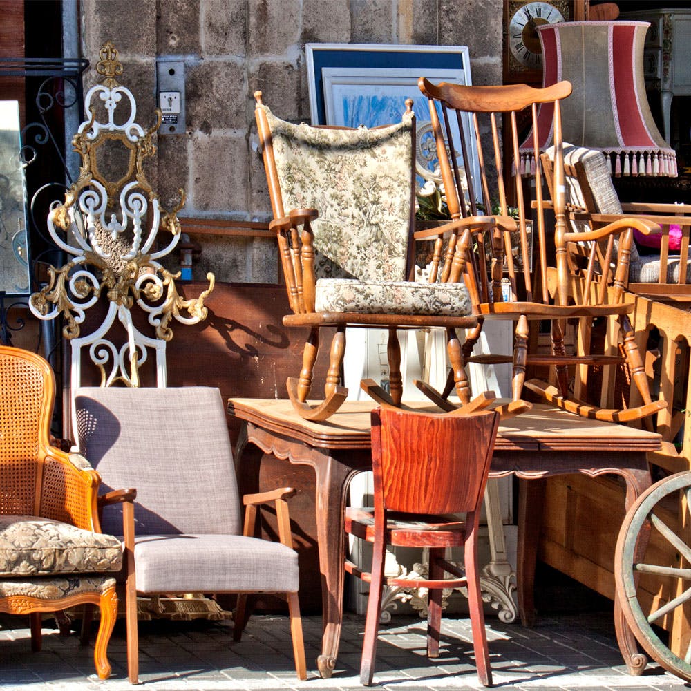 Brown,Furniture,Chair,Wood,Textile,Orange,Outdoor furniture,Interior design,Armrest,Public space