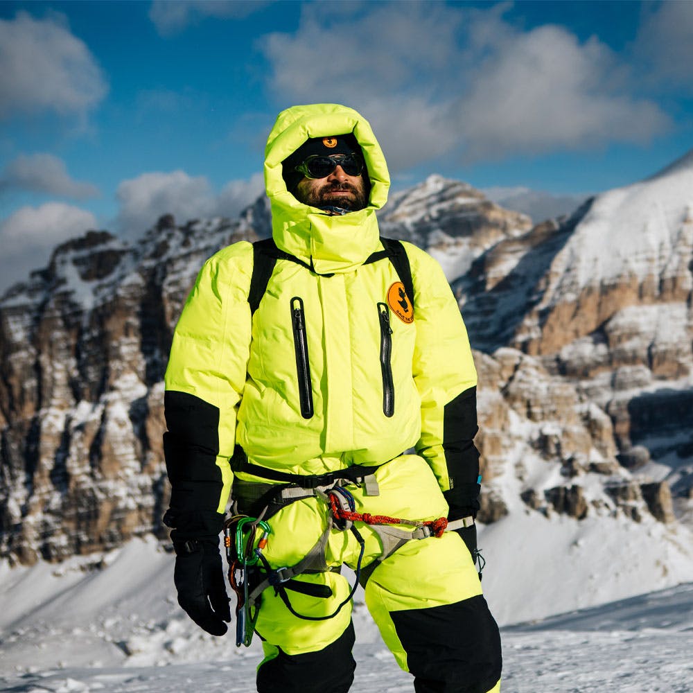 Clothing,Snow,Mountain,Outerwear,Sky,Cloud,Goggles,Sunglasses,Slope,Eyewear