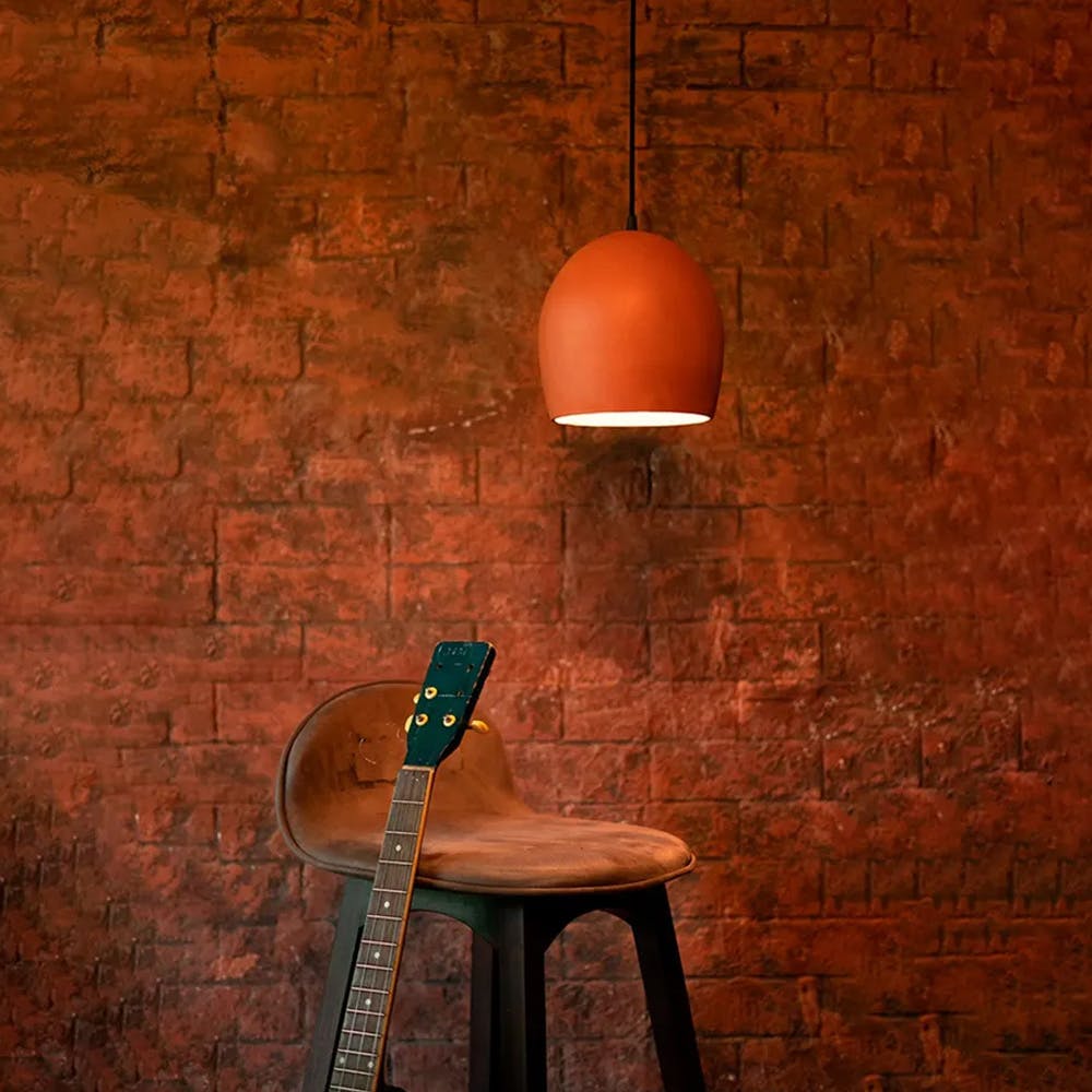 Amber,Wood,Orange,Rectangle,Chair,Stool,Interior design,Brick,Wall,Lamp