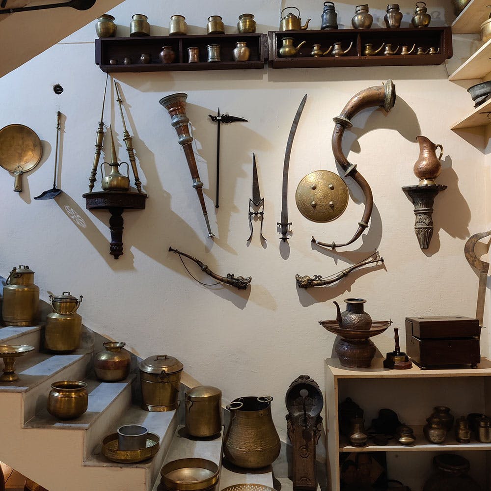 Wood,Shelf,Art,Artifact,Serveware,Metal,Font,Pottery,Creative arts,Shelving