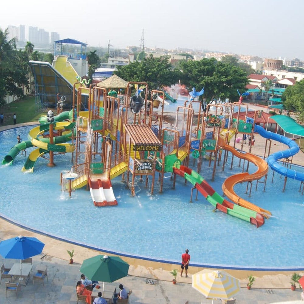 Sky,Chute,Tree,Leisure,Playground,Public space,Fun,Outdoor play equipment,Recreation,City