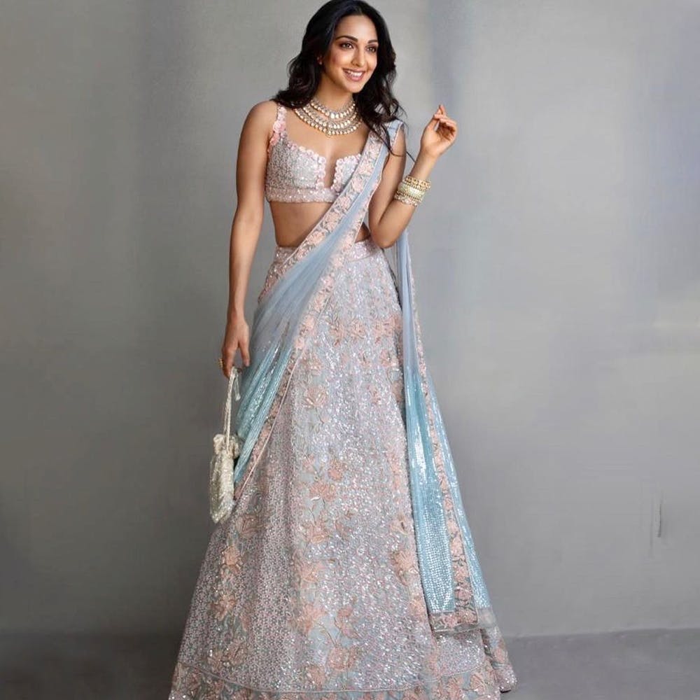 Kiara Advani Chose The Perfect Pastel Lehenga For Armaan Jain's Wedding -  HungryBoo | Indian bridesmaid dresses, Wedding lehenga designs, Indian  bridal outfits
