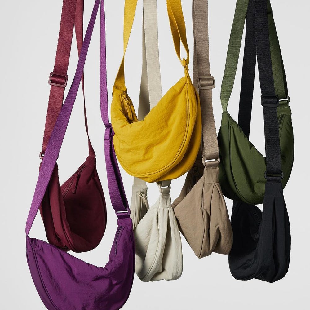 Outerwear,Luggage and bags,Product,Bag,Purple,Shoulder bag,Yellow,Handbag,Material property,Hobo bag
