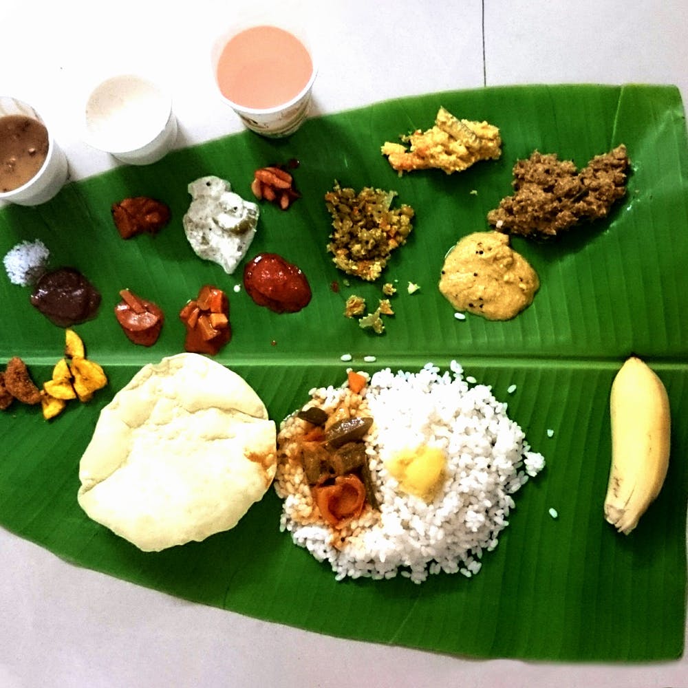 Banana leaf rice,Food,Banana leaf,Tableware,White rice,Binalot,Sadya,Jasmine rice,Rice,Staple food