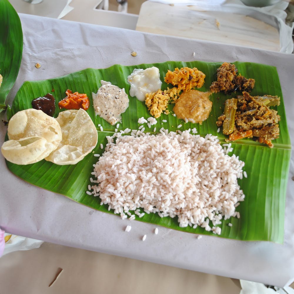 Food,Tableware,White rice,Banana leaf rice,Banana leaf,Ingredient,Rice,Staple food,Recipe,Cuisine