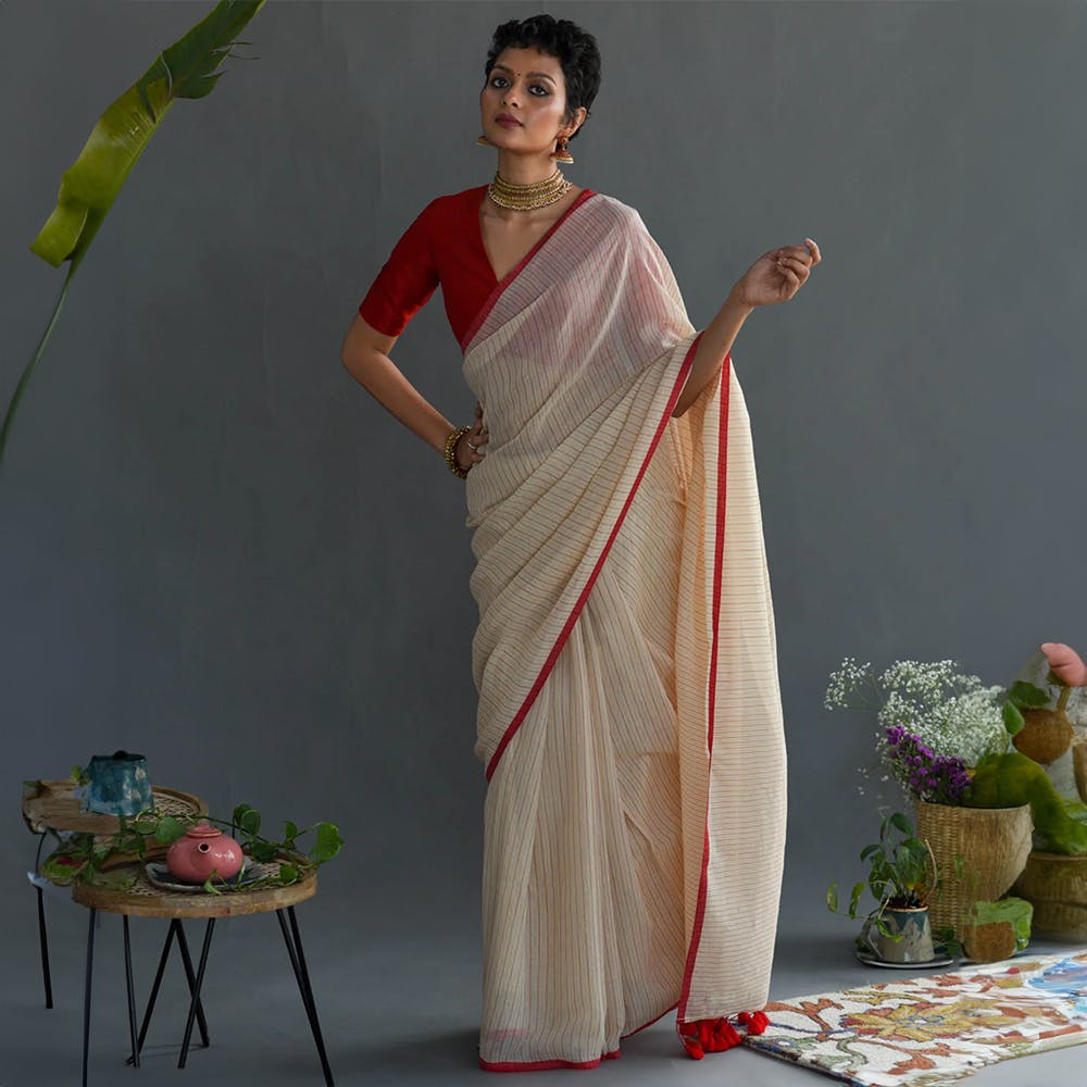 Celebrating Durga Puja in Tussar Matka Saree in White and Red – Bengal  Looms India
