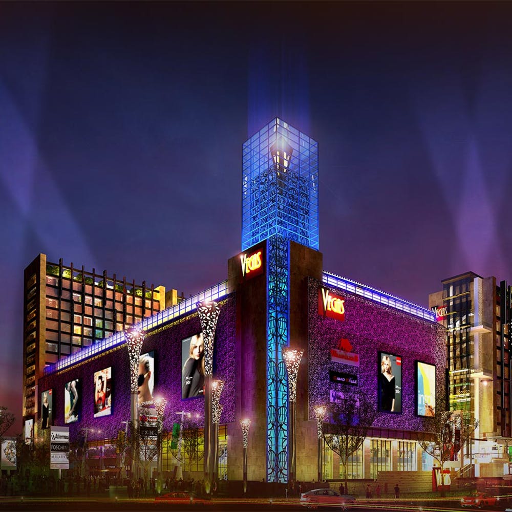 Building,Purple,Sky,Lighting,Tower block,Electricity,Cityscape,Condominium,Commercial building,Facade
