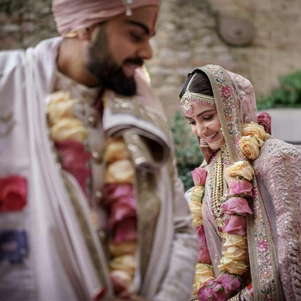 Jasprit Bumrah-Sanjana Ganesan wedding: Bride's blush pink lehenga reminds  us of Anushka Sharma's lehenga - Times of India