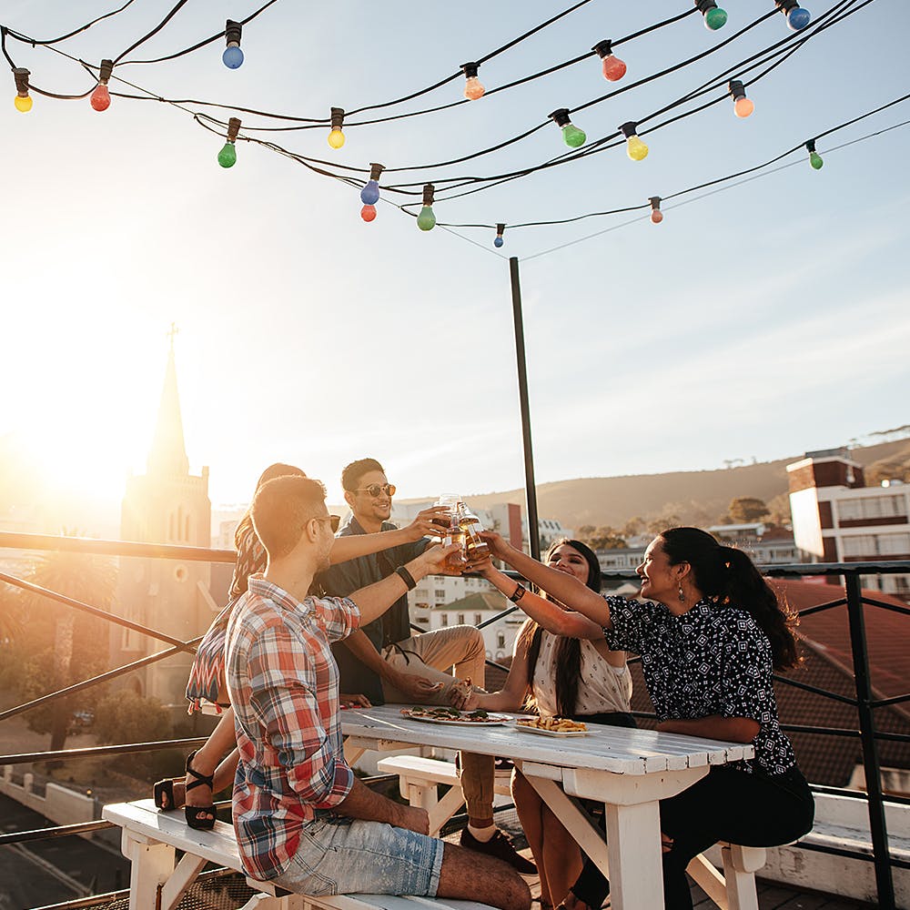 Sky,Daytime,Photograph,Table,Lighting,Architecture,Outdoor furniture,Line,Public space,Leisure