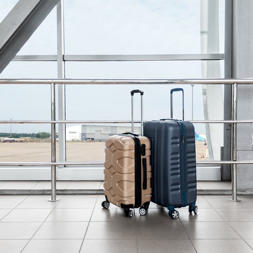 Sky,Luggage and bags,Floor,Gas,Flooring,Automotive exterior,Bag,Rolling,Automotive tire,Wood