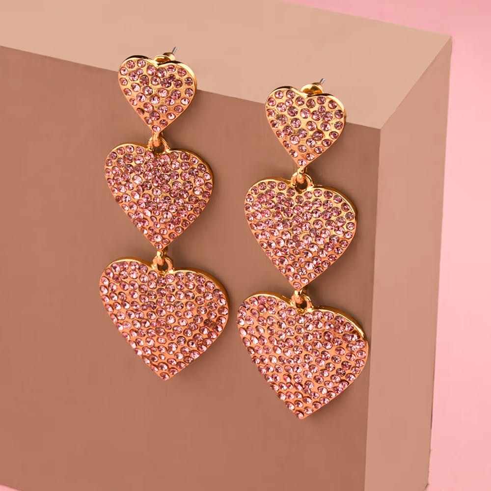 Gold Toned Pink Stone Studed Triple Heart Dangler Earrings