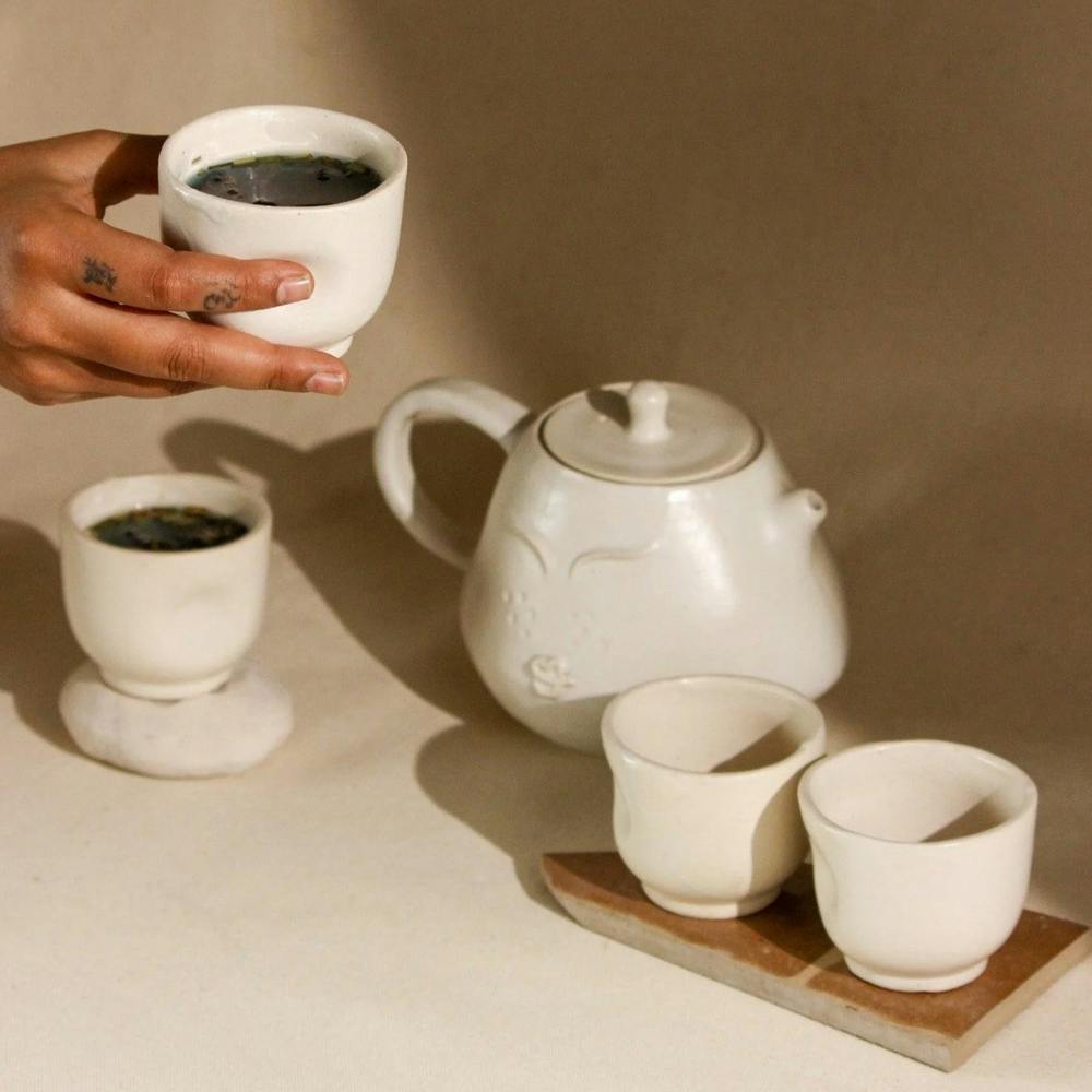 Tableware,Drinkware,Dishware,Cup,Kona coffee,Serveware,Teacup,Pottery,Porcelain,Coffee