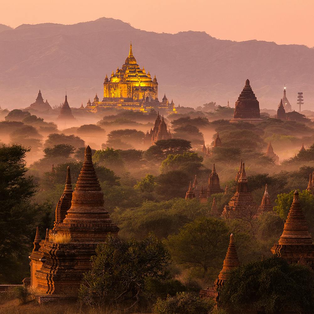 Mountain,Sky,Ecoregion,Natural landscape,Temple,Afterglow,Atmospheric phenomenon,Biome,Pagoda,Dusk