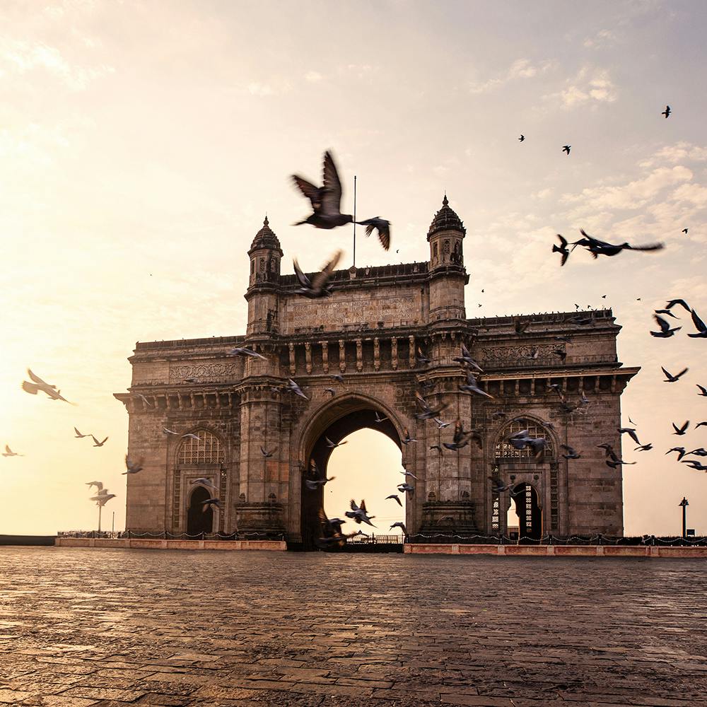 Sky,Cloud,Bird,World,Landmark,Tints and shades,Water,Monument,City,Arch