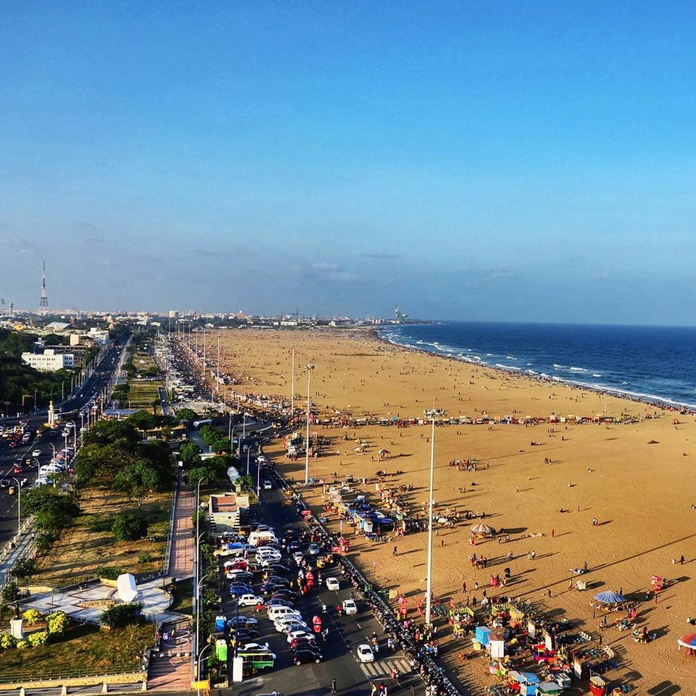 Sky,Water,Natural environment,Beach,Coastal and oceanic landforms,People on beach,Urban design,Horizon,Landscape,Travel