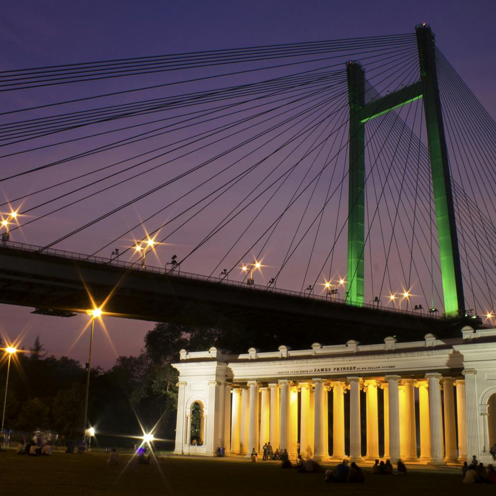 Sky,Street light,Light,Lighting,Electricity,Dusk,Cityscape,City,Bridge,Tower block