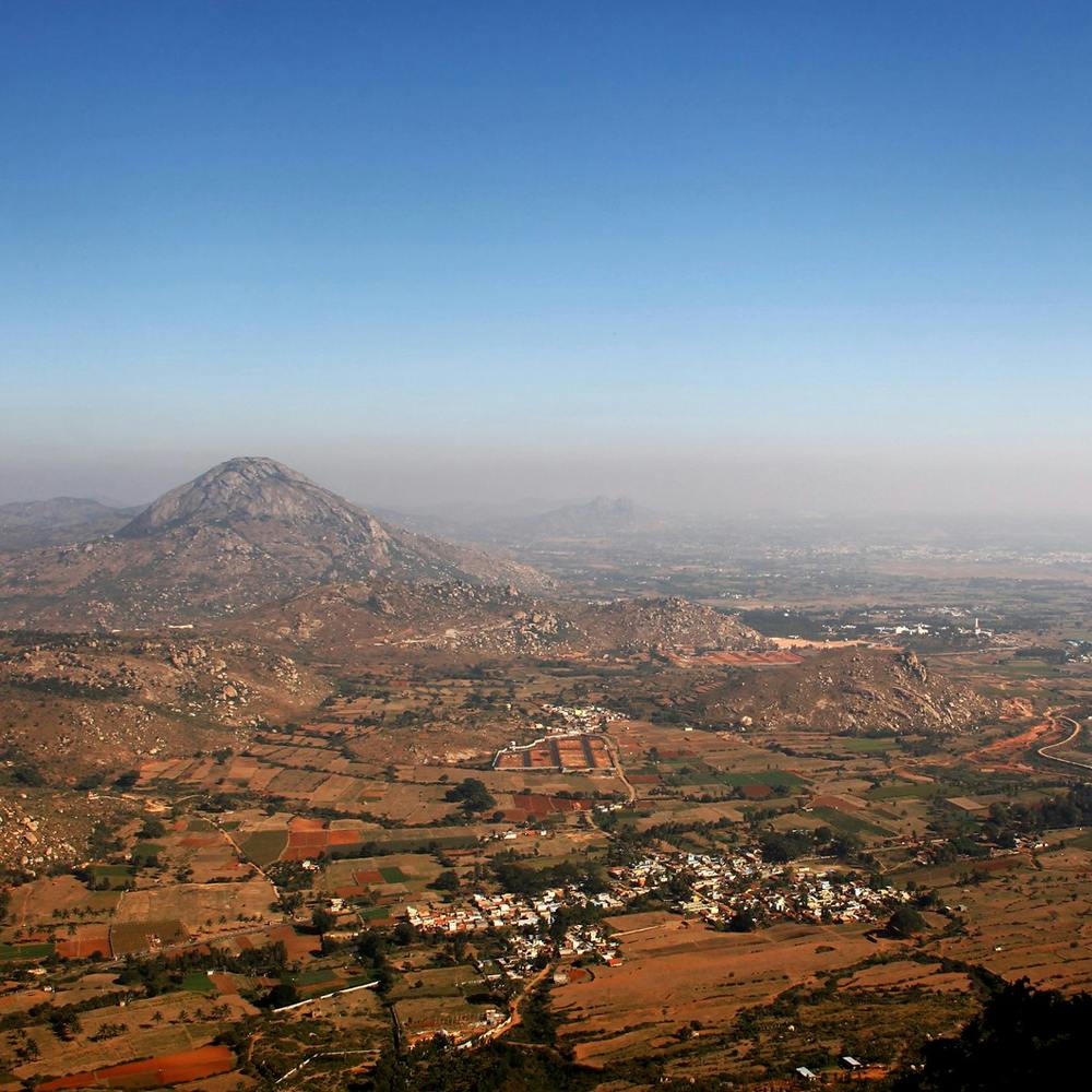 Sky,Atmosphere,Ecoregion,Nature,Mountain,Highland,Horizon,Landscape,Plain,City