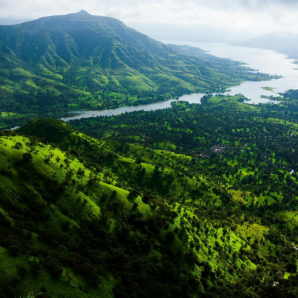 Water,Cloud,Mountain,Water resources,Sky,Green,Natural landscape,Watercourse,Bank,Tree