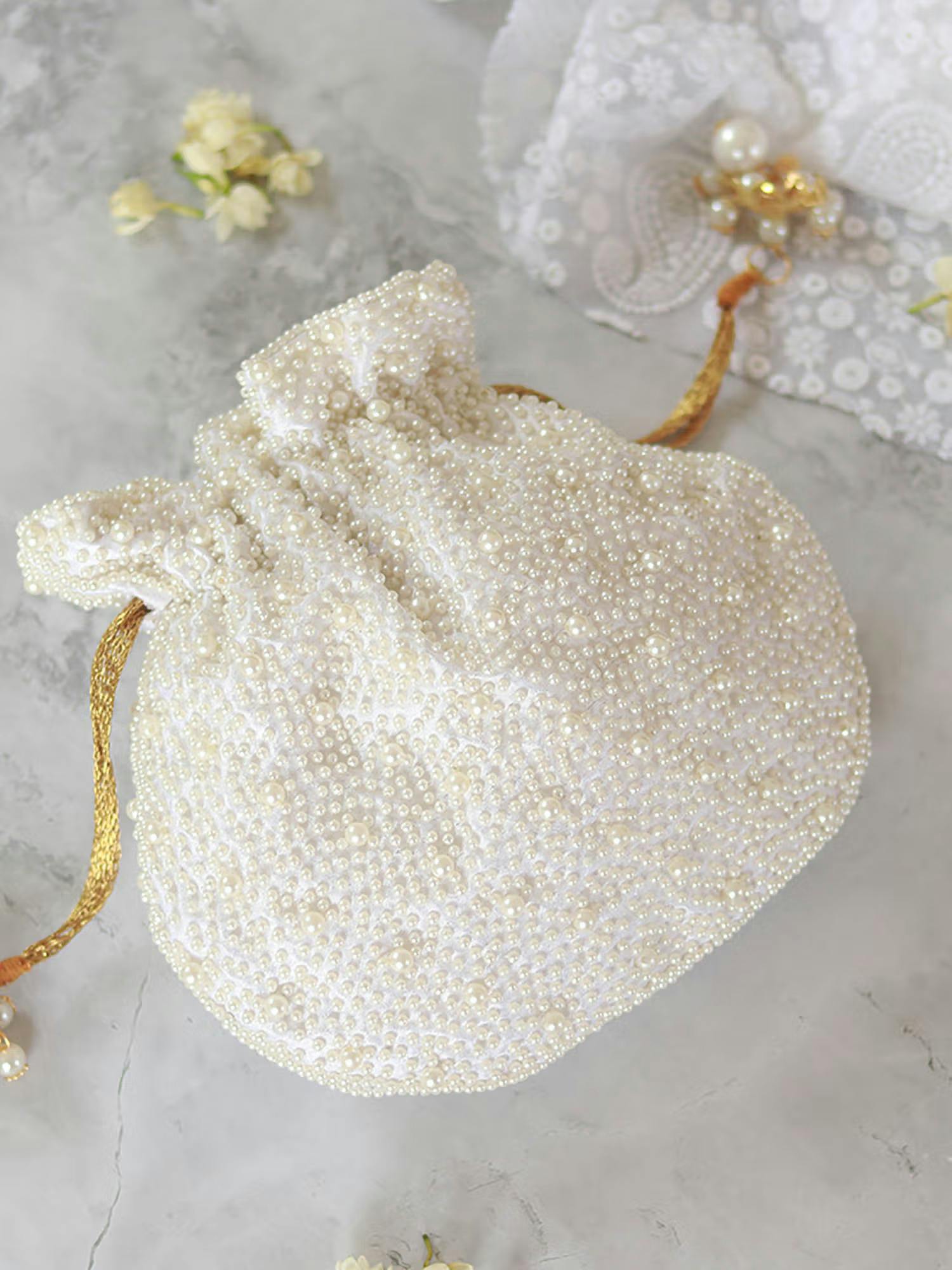 Nayaab White Pearl Potli Bag With Handle