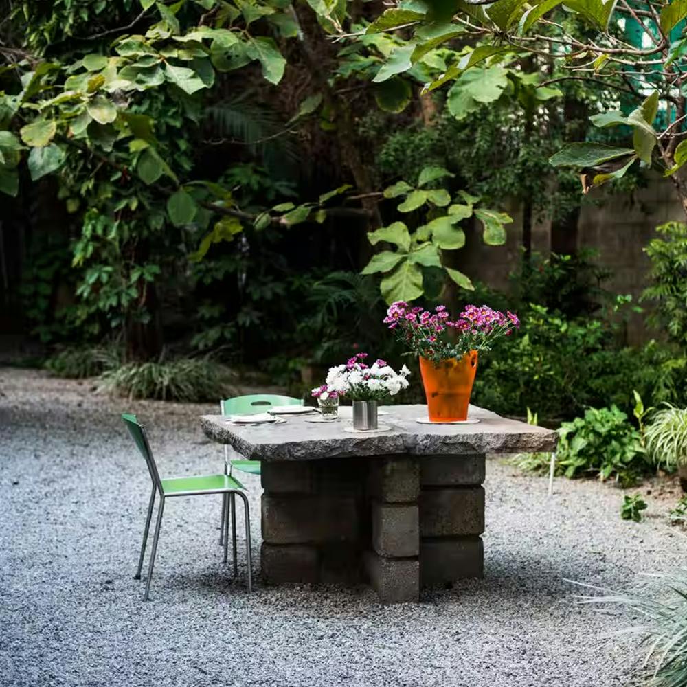 Plant,Flower,Flowerpot,Table,Outdoor furniture,Outdoor table,Houseplant,Window,Grass,Chair